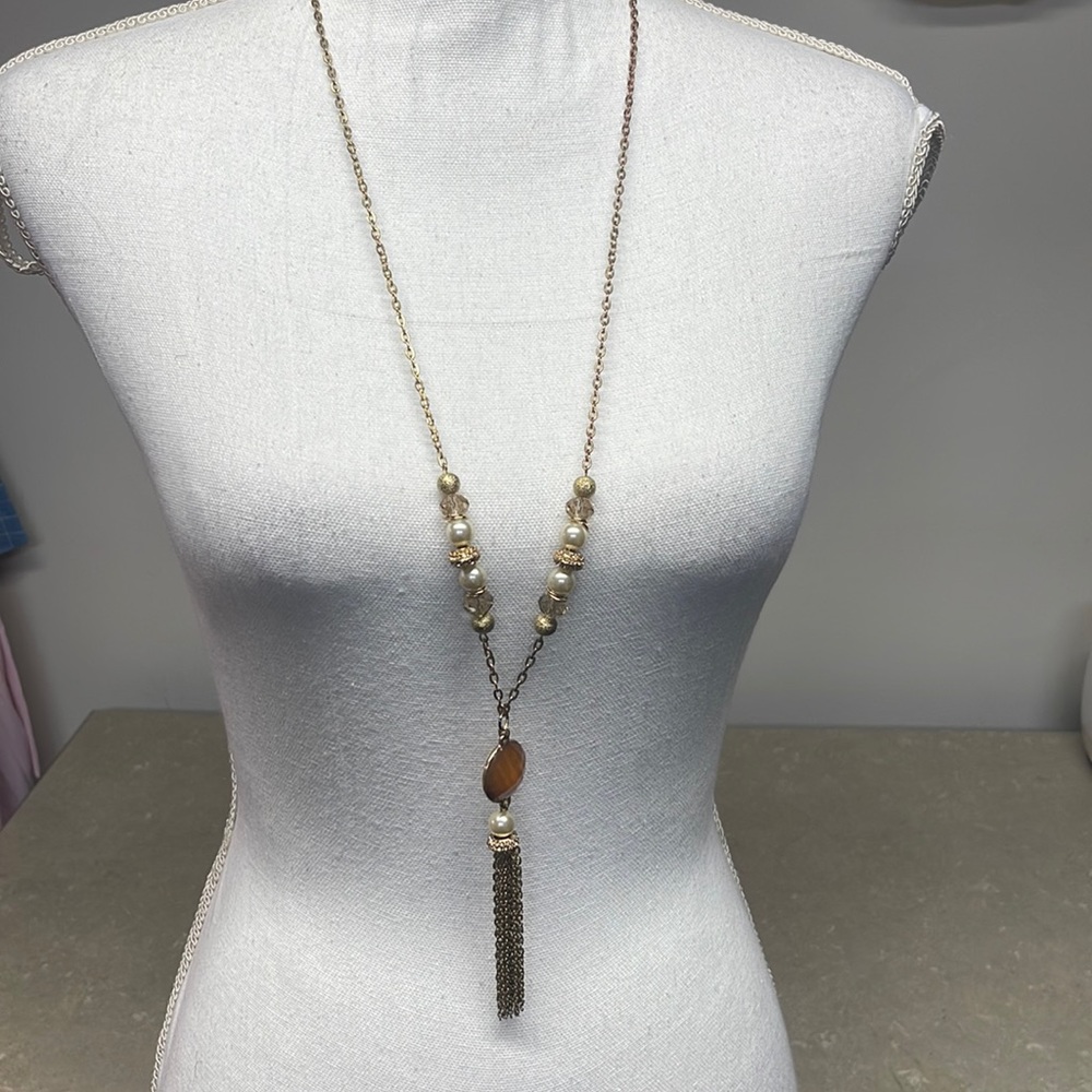 One sworn New York and Company tassel necklace excellent condition